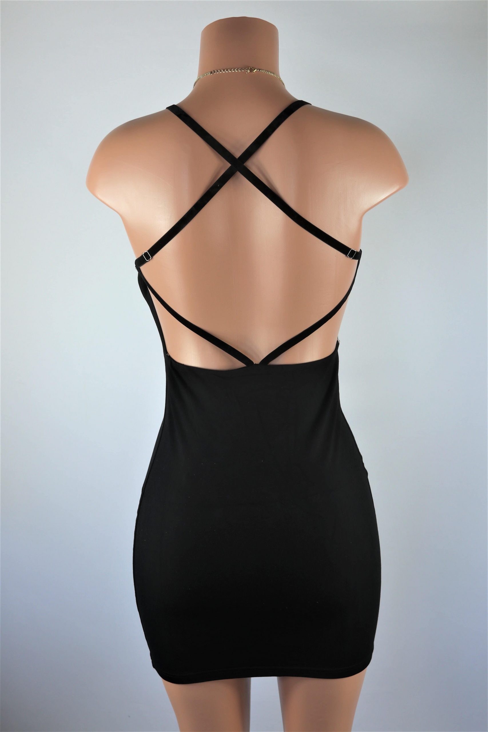 No Plain Jane - Plain black halter criss cross back mini dress.