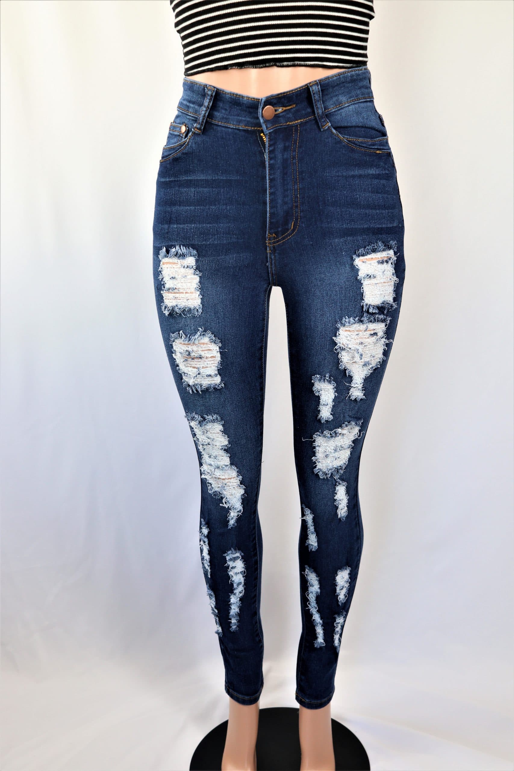 Carlos Pants - Medium wash high waist ripped skinny jeans.