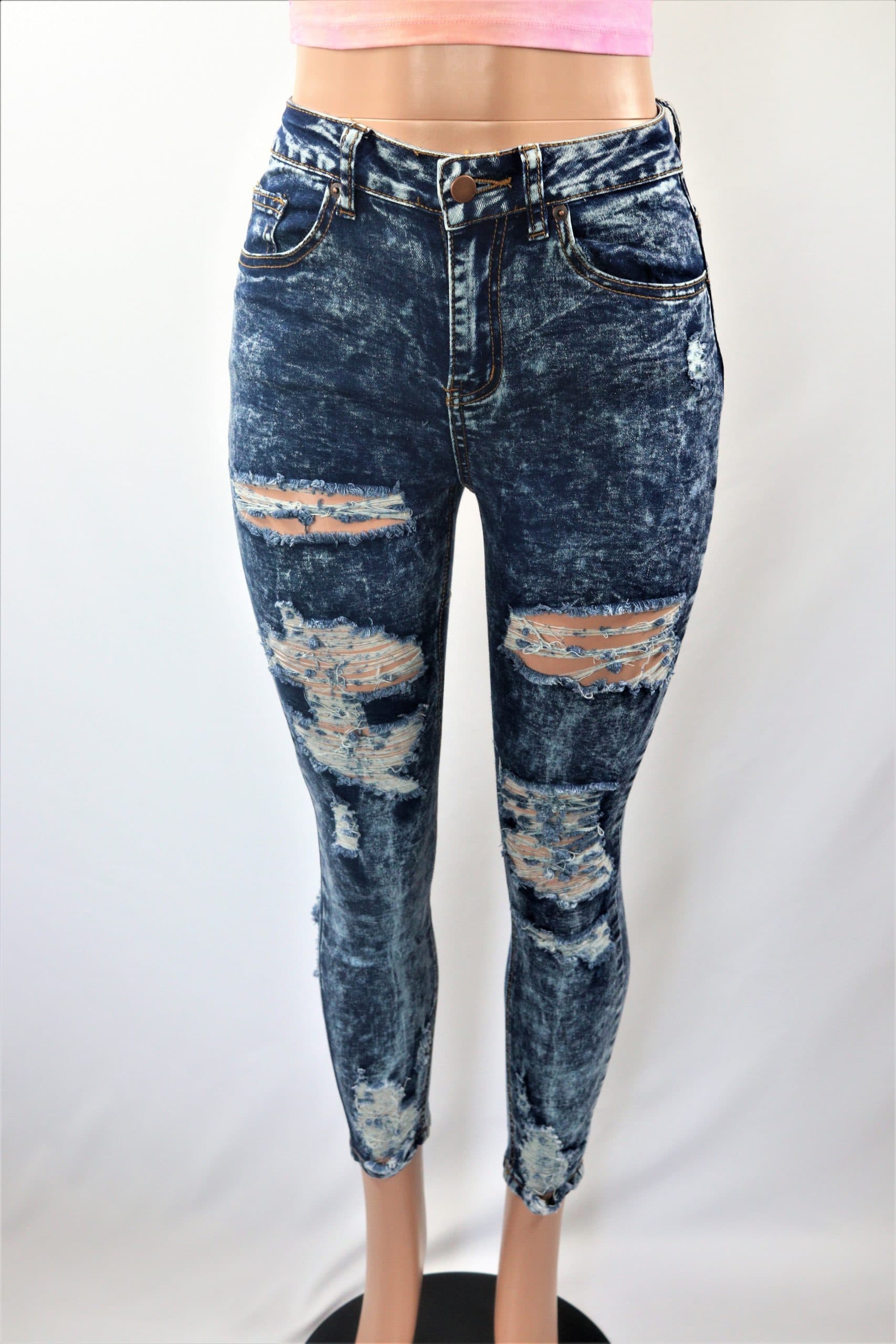 Axel Jeans Blue acid wash midhigh waist ripped skinny ankle jeans.